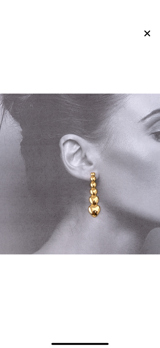 Brincos longos coração